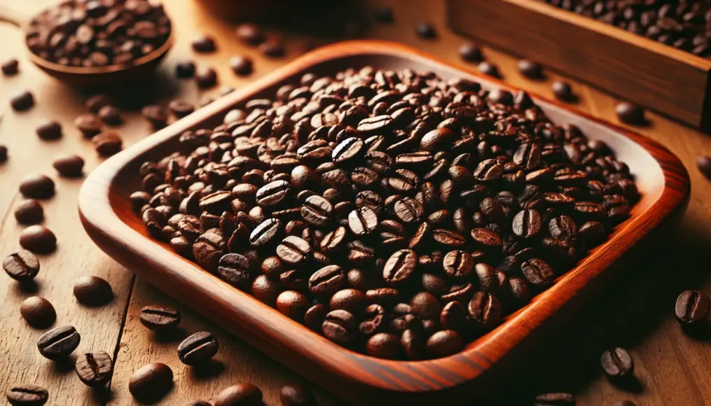 Dark roast coffee beans spread on a wooden tray, releasing a rich roasted aroma